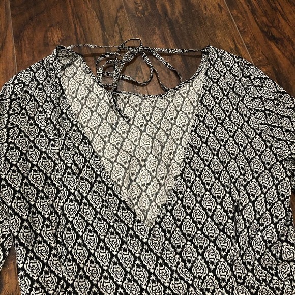 3/$25 Dainty Hooligan Bell Sleeve Romper - Picture 7 of 8